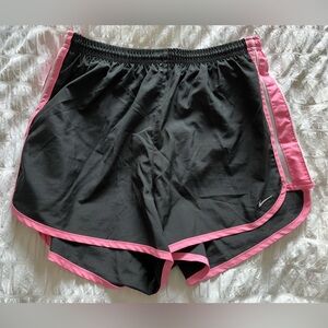 Black and pink Nike running shorts